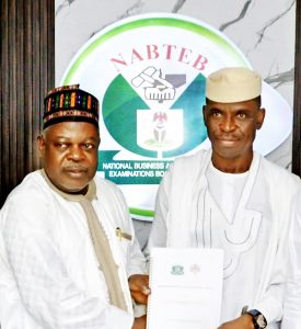 Dr. Mohammed A. Mohammed, Registrar&CEO NABTEB (left) and Chief Abiodun Odusanwo, ITPN President